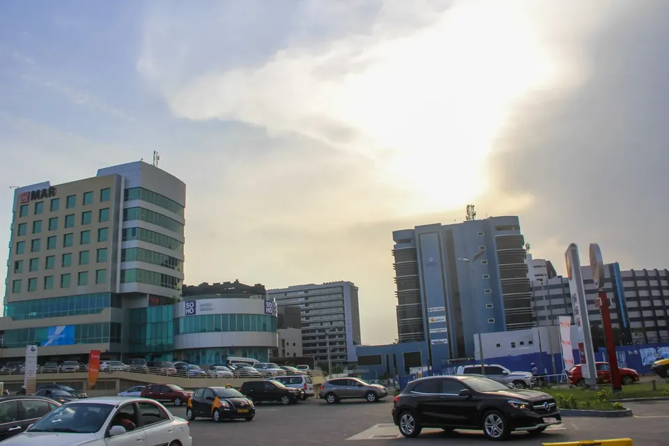 Accra skyline seen from Airport City, with modern office towers under a clear sky
