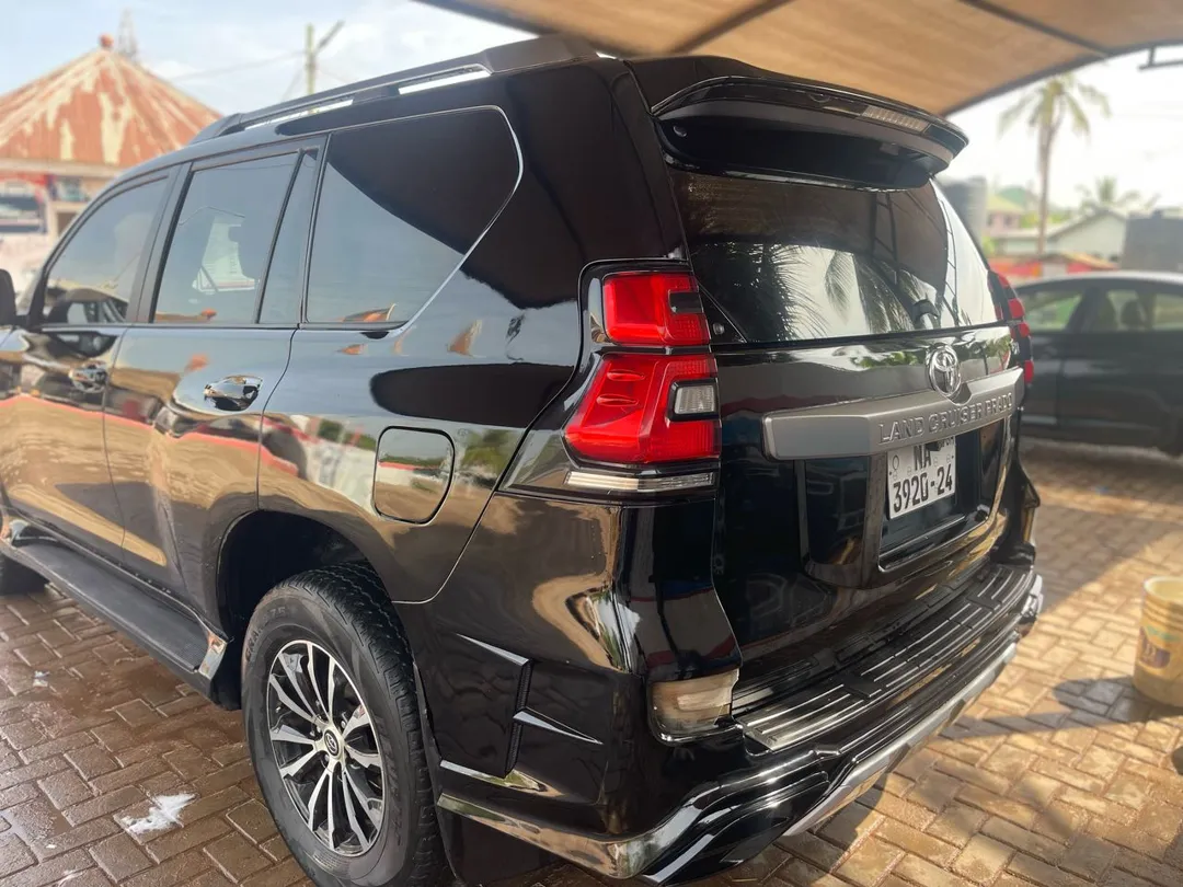 AKD Rentals - black Toyota Land Cruiser Prado, rear view