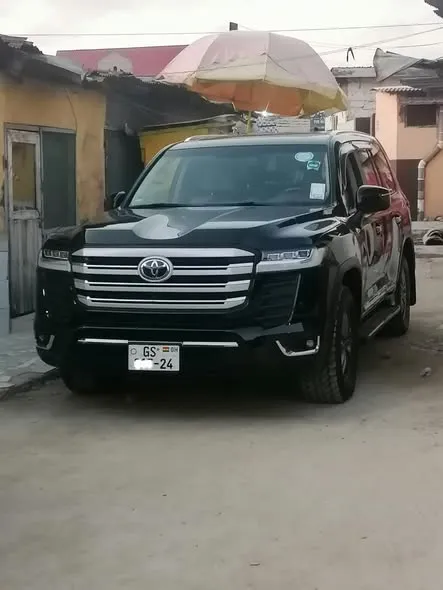 Ed Car Rental - black Toyota Land Cruiser, front view