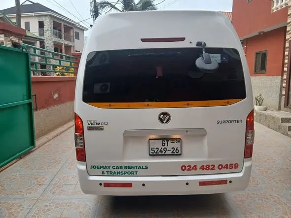 Joemay - white Foton minibus, rear view