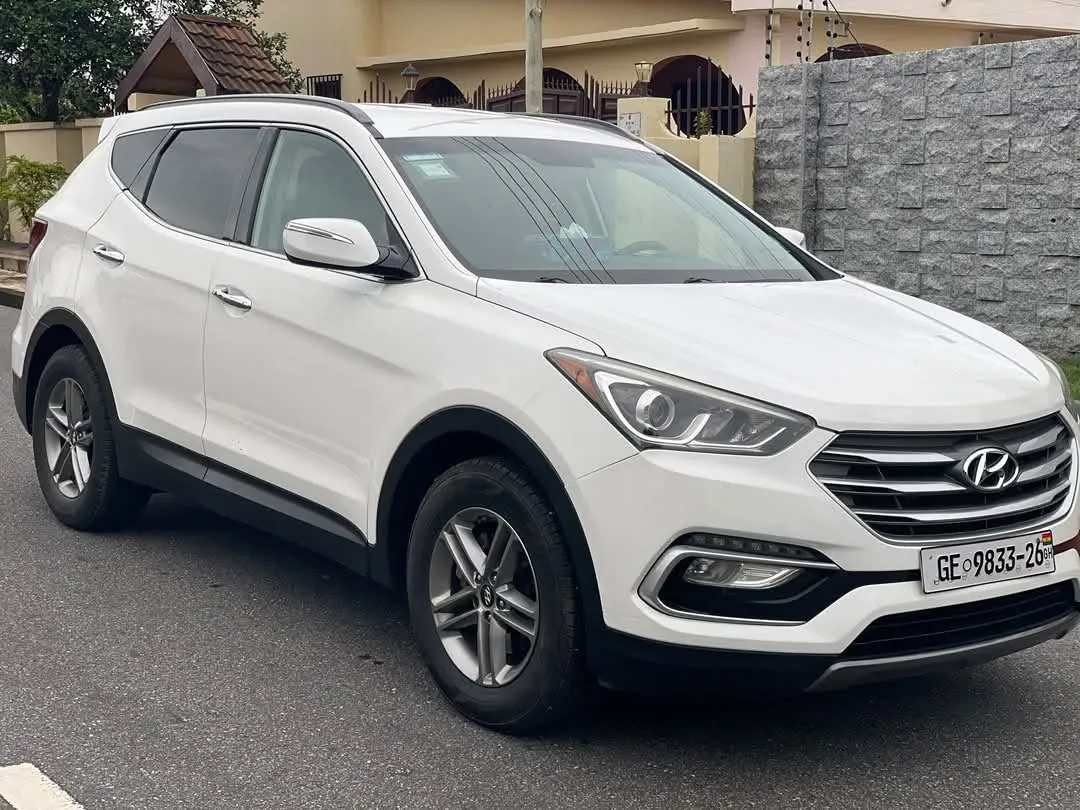 Ovvadrive Car Rental - white Hyundai Santa Fe