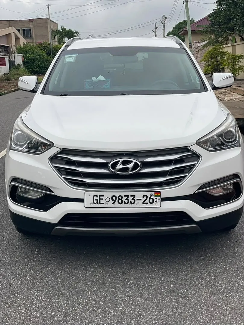 Ovvadrive Car Rental - white Hyundai Santa Fe, front view
